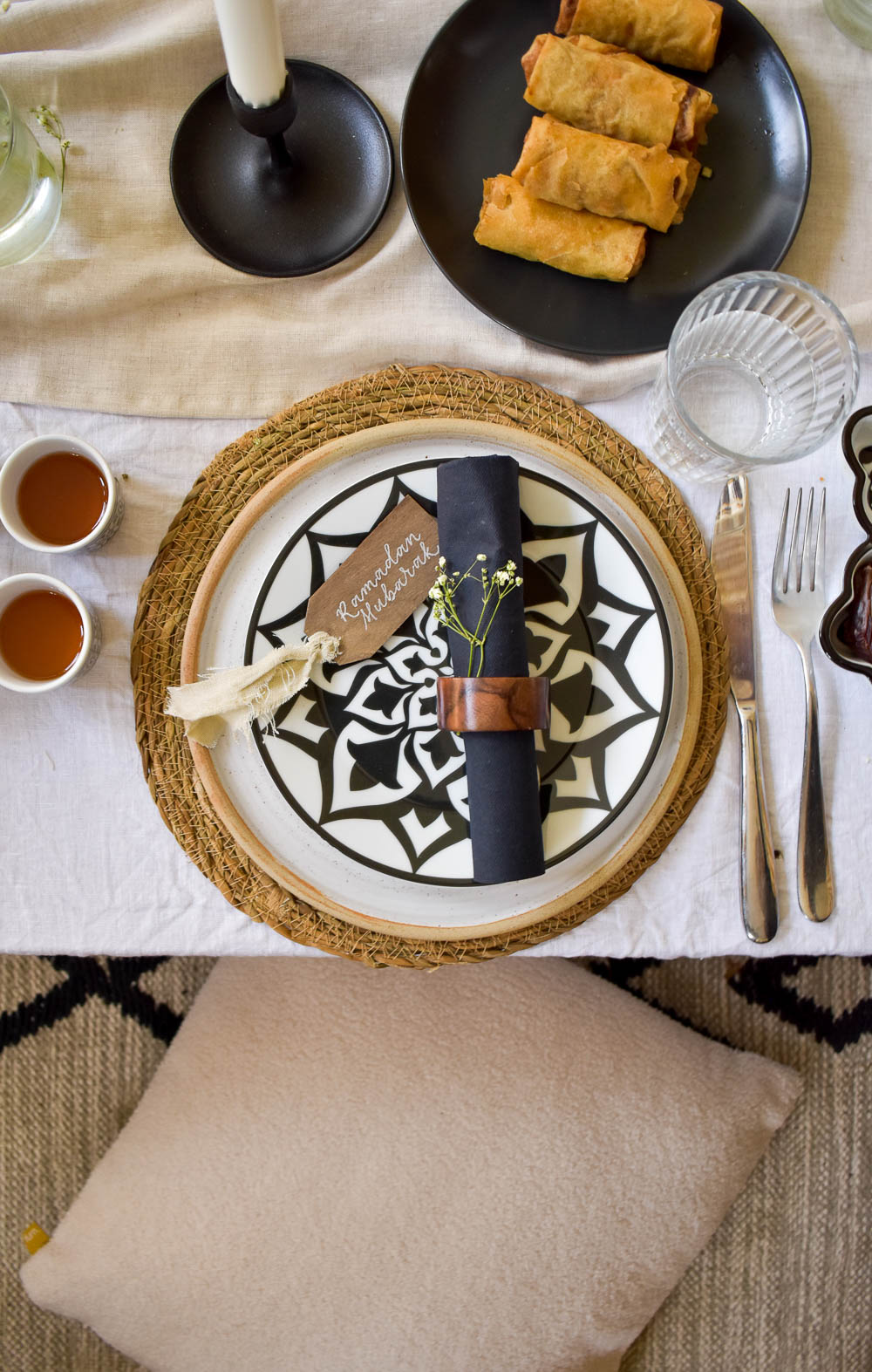 Overhead view of Ramadan tablescape with pillow for seating